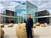 A boy standing in front of the North Dakota Heritage Center & State Museum