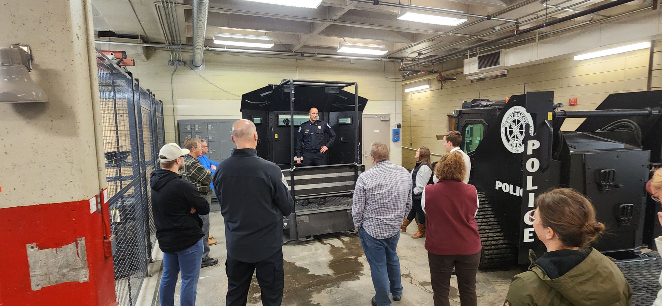 Citizen Academy tours the Police Department's garage. 