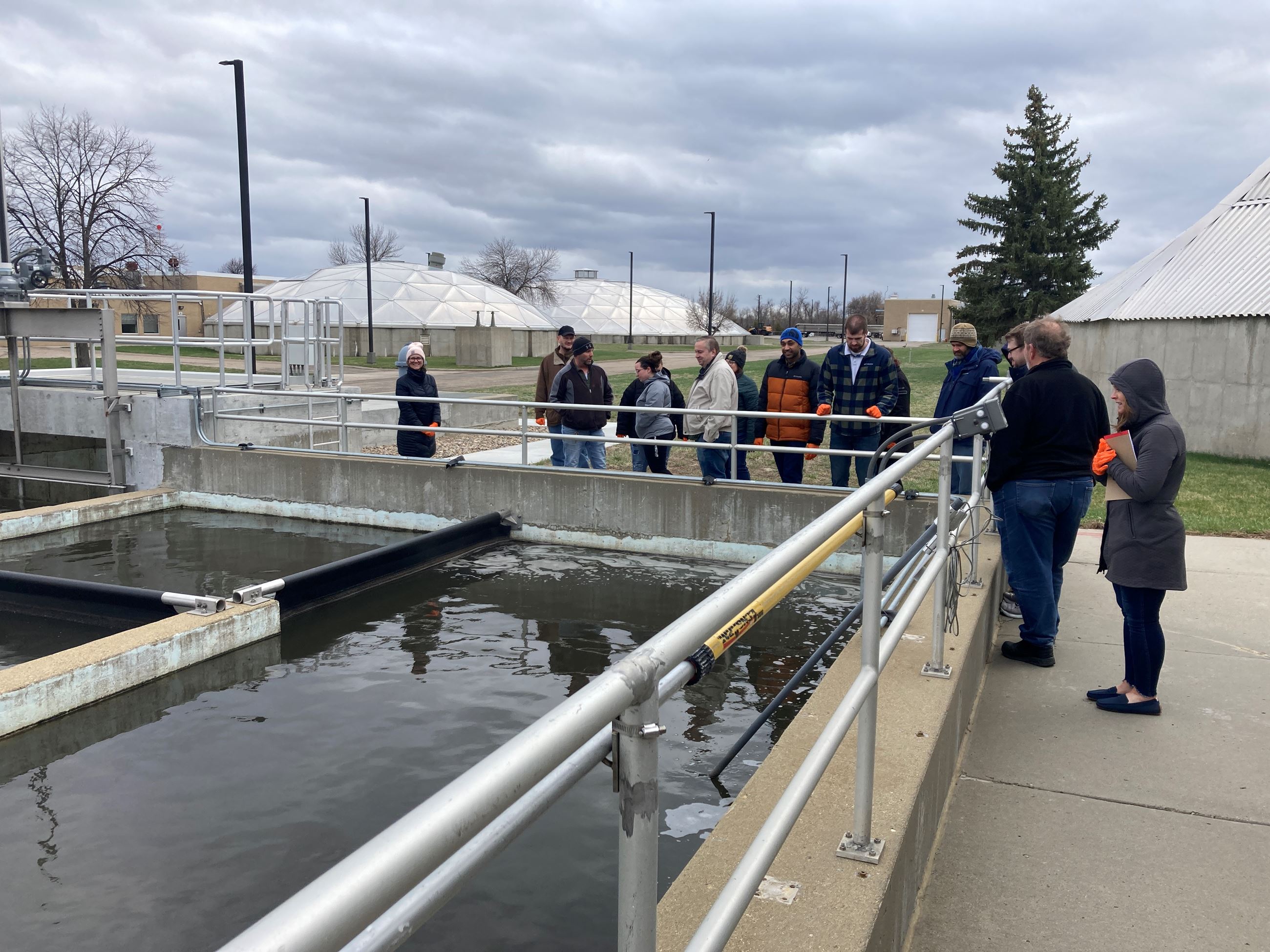 2024 Citizen Academy looks at wastewater treatment pond. 