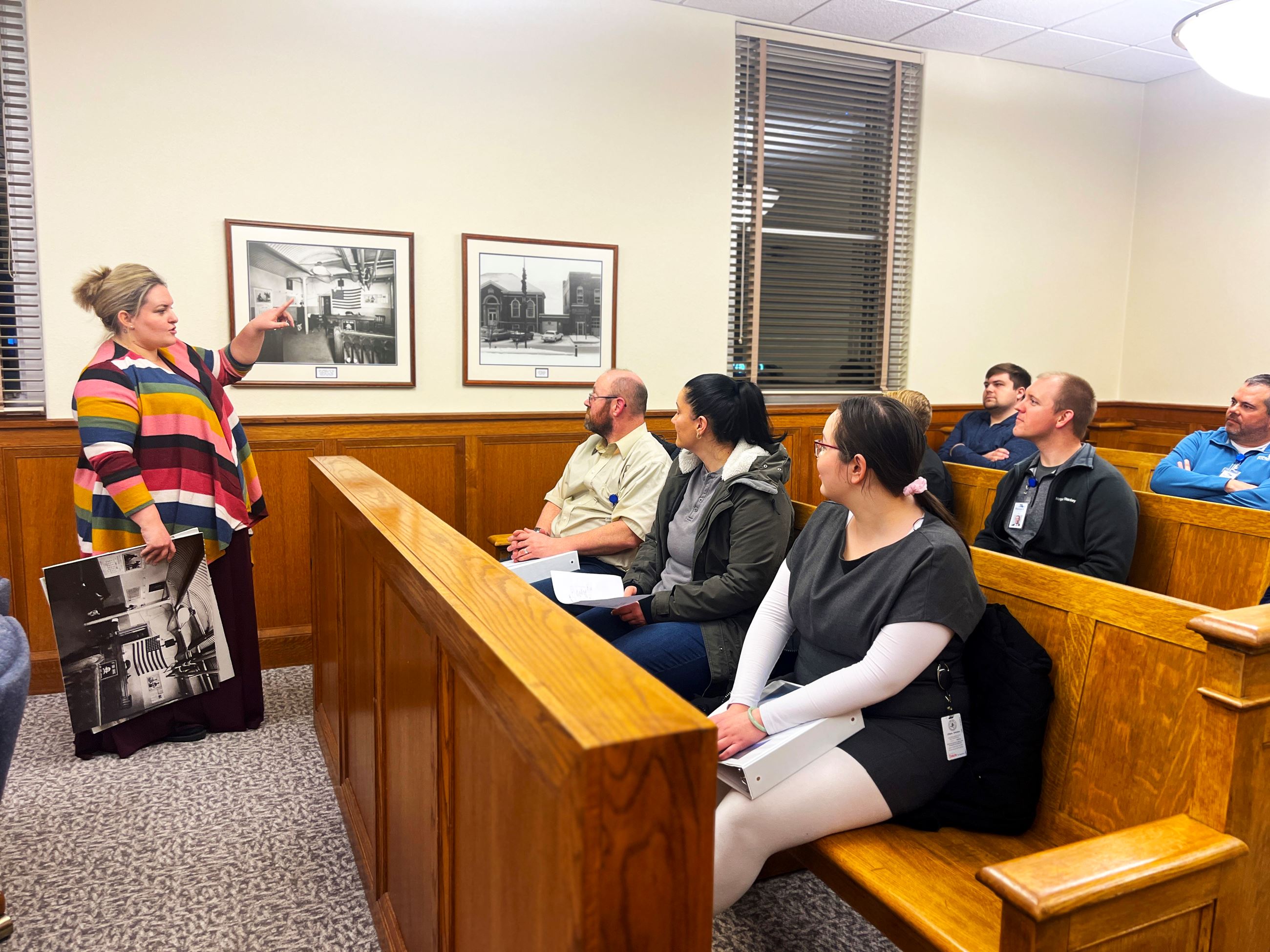 Citizen Academy attendees listen to a presentation in the municipal court. 