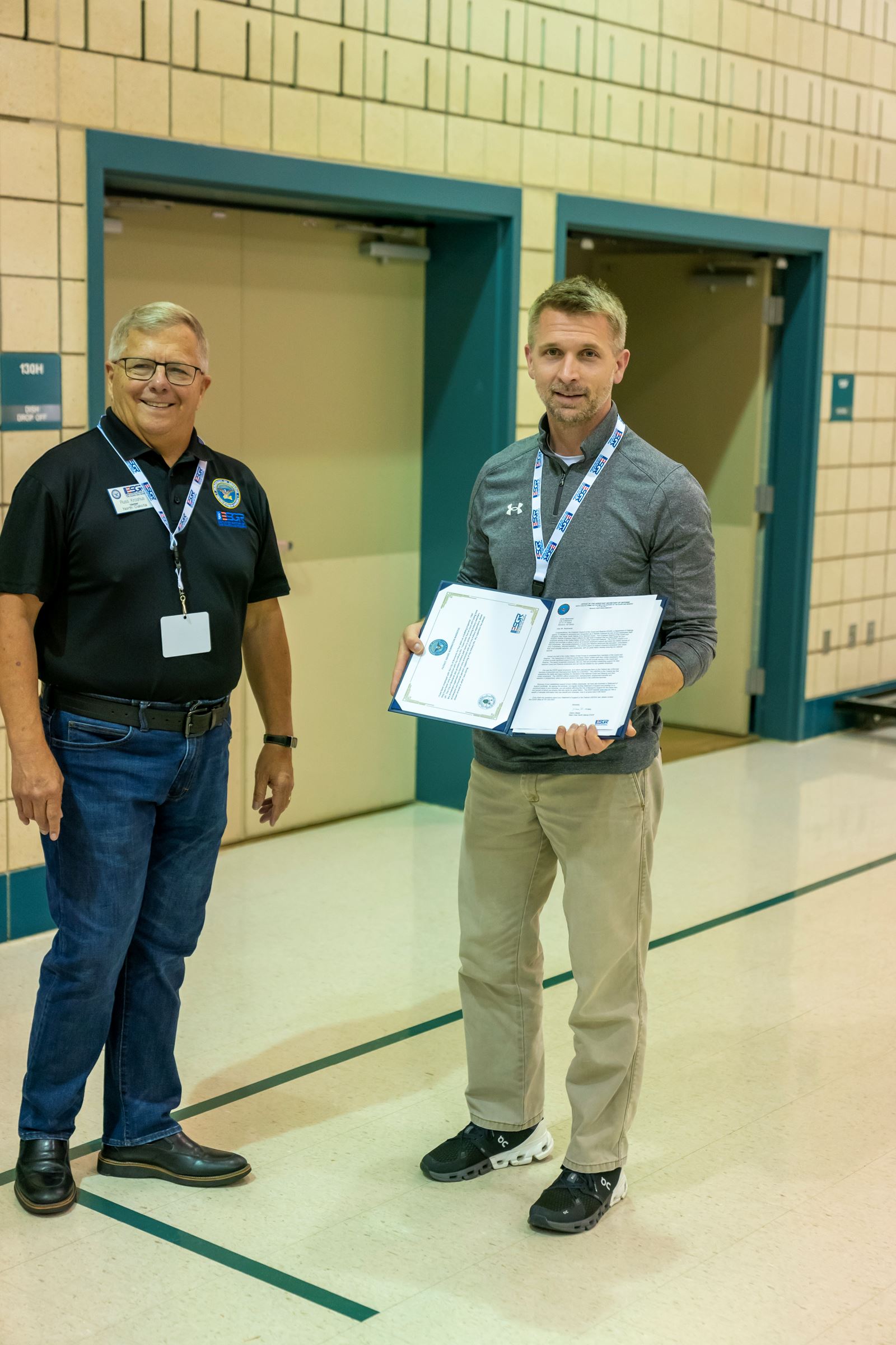 Brady Blaskowski receives the ESGR Patriot Award from ESGR Representative Russell Kroshus