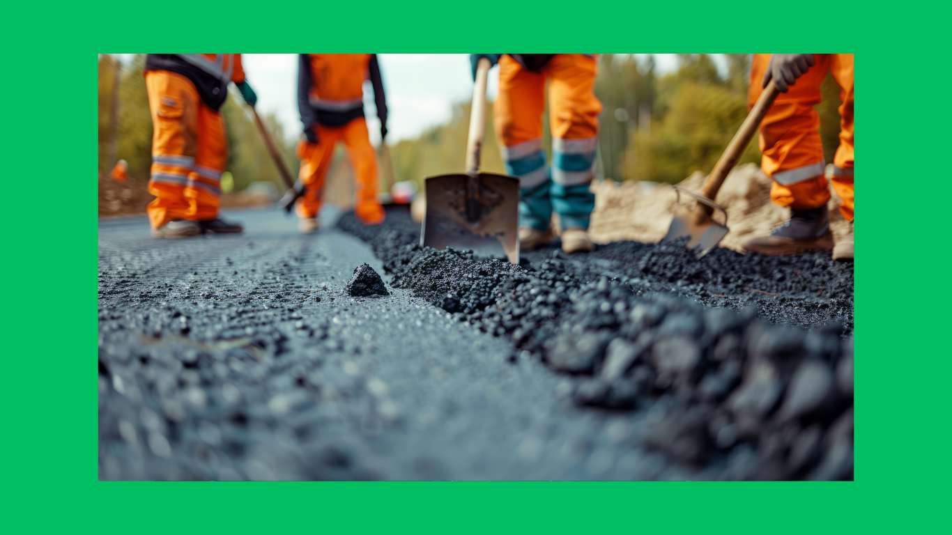 Construction workers working on roadway